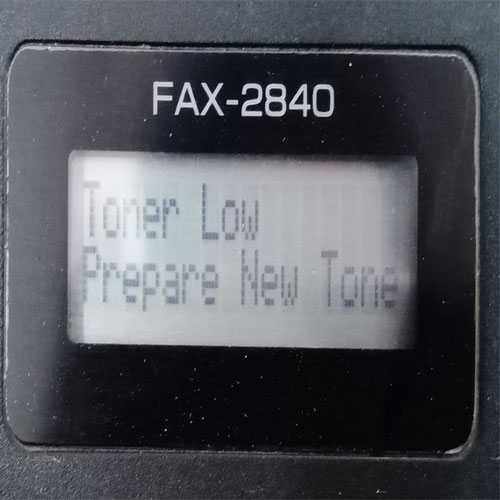 máy in brother fax 2840 báo toner low